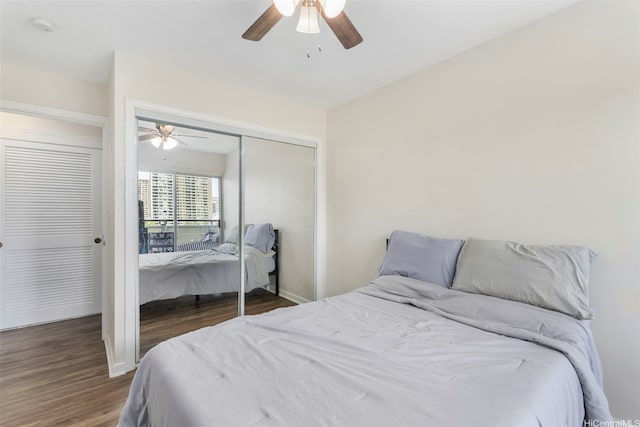 509 University Ave Unit 1001, Honolulu, HI 96826 - bedroom with wood finished floors, ceiling fan, and a closet