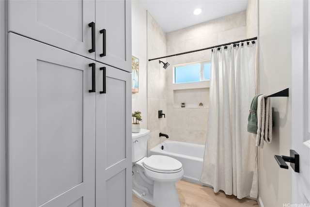 1076 Kahili St, Kailua, HI 96734 - full bathroom featuring shower / bath combo with shower curtain and wood finished floors