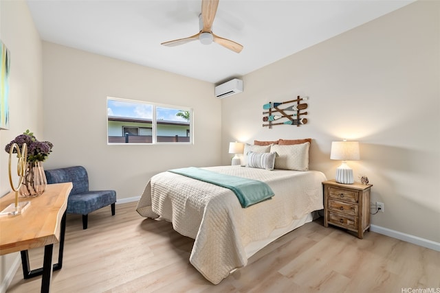 1076 Kahili St, Kailua, HI 96734 - bedroom with a wall mounted AC, light wood finished floors, and a ceiling fan