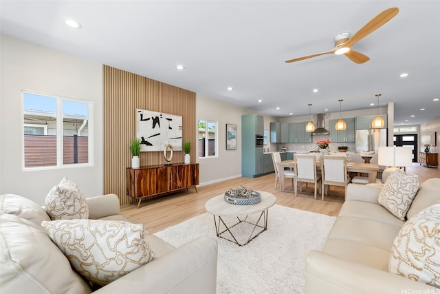 1076 Kahili St, Kailua, HI 96734 - living room featuring a ceiling fan, light wood-type flooring, and recessed lighting