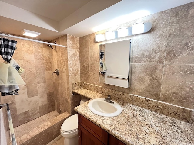 1700 Ala Moana Blvd Unit 1702, Honolulu, HI 96815 - full bath with a tile shower, vanity, tile walls, and tasteful backsplash