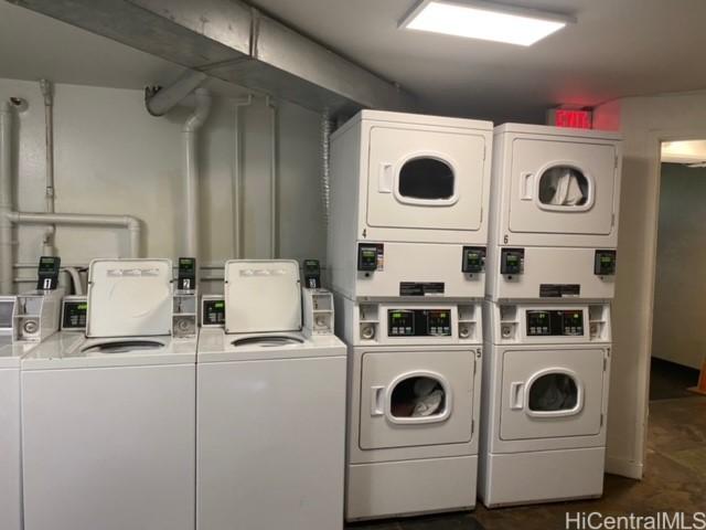 1700 Ala Moana Blvd Unit 1702, Honolulu, HI 96815 - communal laundry room with stacked washer and clothes dryer and washing machine and dryer
