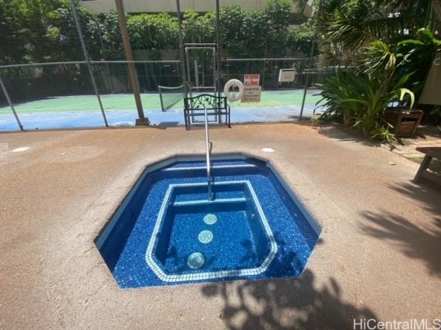1700 Ala Moana Blvd Unit 1702, Honolulu, HI 96815 - view of swimming pool featuring an in-ground hot tub and a swimming pool