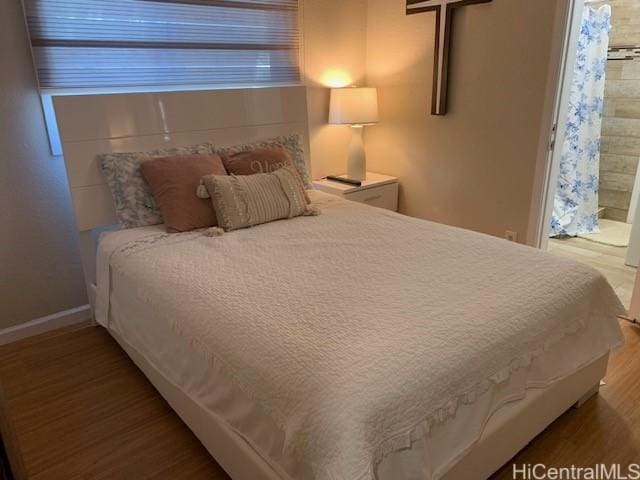 3395 Hardesty St, Honolulu, HI 96816 - bedroom with wood finished floors and ensuite bath