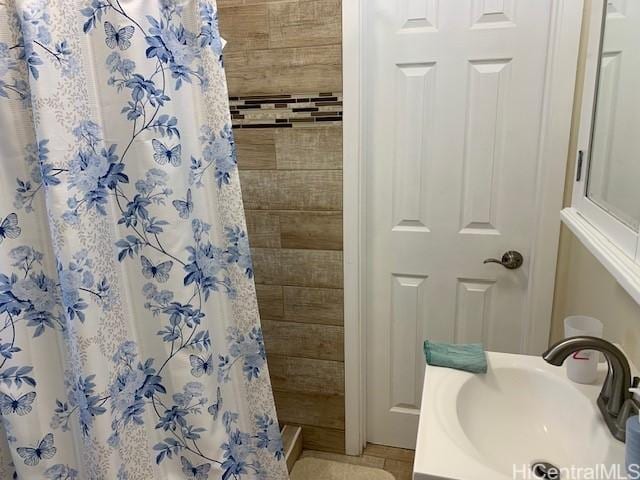 3395 Hardesty St, Honolulu, HI 96816 - full bathroom featuring a shower with shower curtain and vanity