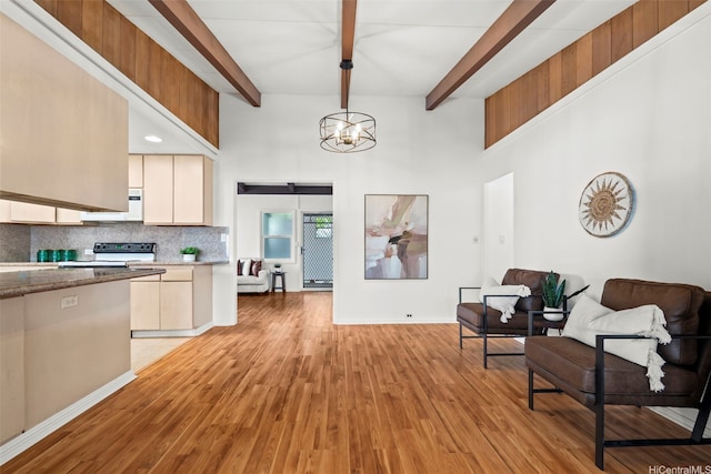 45-825 Anoi Rd, Kaneohe, HI 96744 - kitchen with electric range oven, beamed ceiling, open floor plan, backsplash, and light wood finished floors