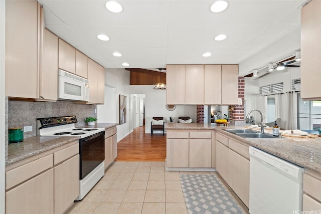 45-825 Anoi Rd, Kaneohe, HI 96744 - kitchen with white appliances, light tile patterned floors, backsplash, recessed lighting, and a peninsula
