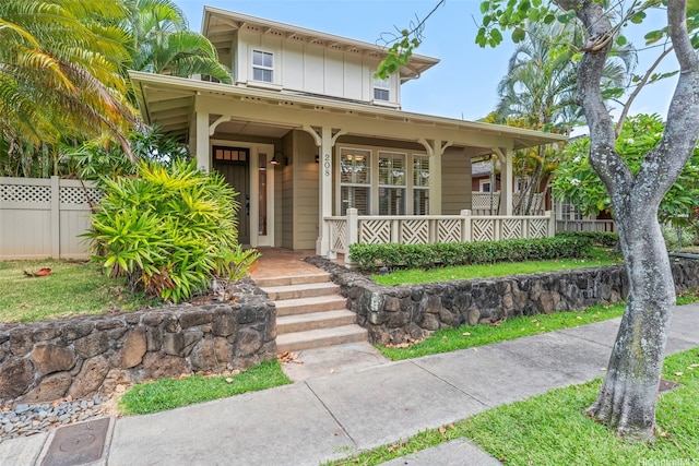 520 Lunalilo Home Rd Unit 208, Honolulu, HI 96825 - view of front of property with a porch and board and batten siding