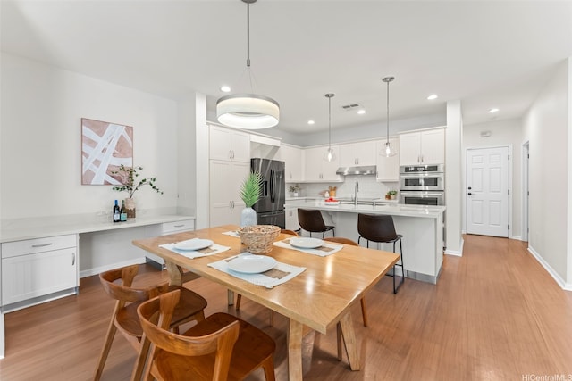 520 Lunalilo Home Rd Unit 208, Honolulu, HI 96825 - dining space with light wood-type flooring and recessed lighting