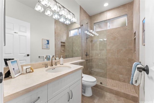 520 Lunalilo Home Rd Unit 208, Honolulu, HI 96825 - bathroom featuring vanity, a tile shower, tile patterned floors, and recessed lighting