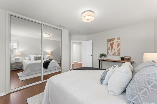520 Lunalilo Home Rd Unit 208, Honolulu, HI 96825 - bedroom with wood finished floors and a closet