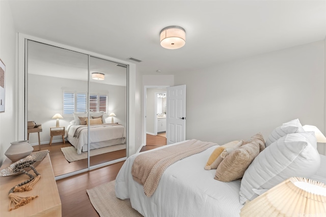 520 Lunalilo Home Rd Unit 208, Honolulu, HI 96825 - bedroom featuring a closet and wood finished floors