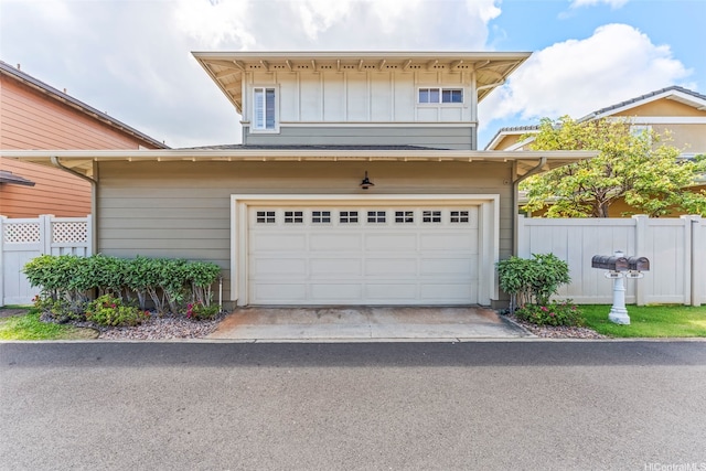520 Lunalilo Home Rd Unit 208, Honolulu, HI 96825 - view of front of property featuring an attached garage and board and batten siding
