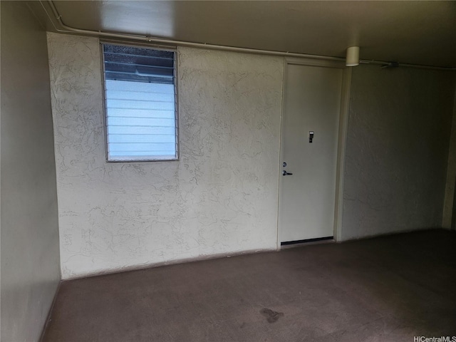 98-099 Uao Pl Unit Ph5, Aiea, HI 96701 - carpeted spare room featuring a textured wall