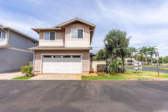 91-1001 Keaunui Dr Unit 97, Ewa Beach, HI 96706 - view of front of house with an attached garage and driveway