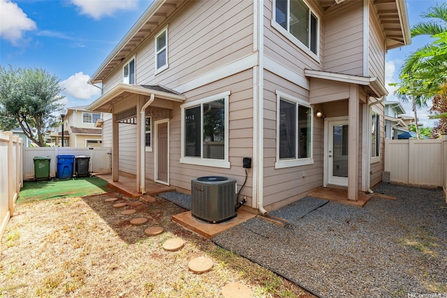 91-1001 Keaunui Dr Unit 97, Ewa Beach, HI 96706 - back of house with a fenced backyard and a patio
