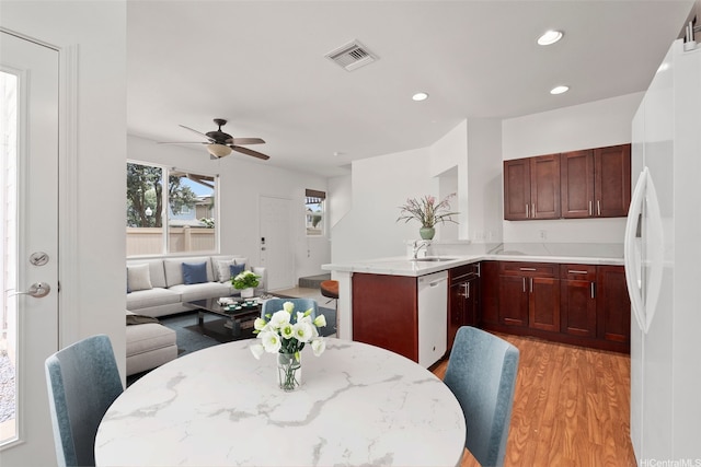 91-1001 Keaunui Dr Unit 97, Ewa Beach, HI 96706 - dining space featuring light wood-type flooring, ceiling fan, and recessed lighting