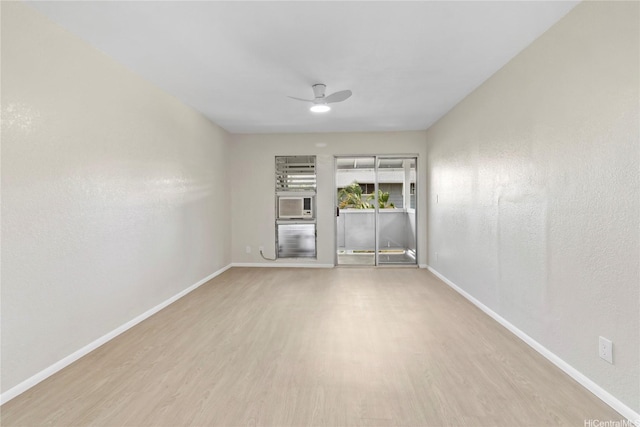 98-467 Hookanike St Unit 758, Pearl City, HI 96782 - spare room featuring wood finished floors and a ceiling fan