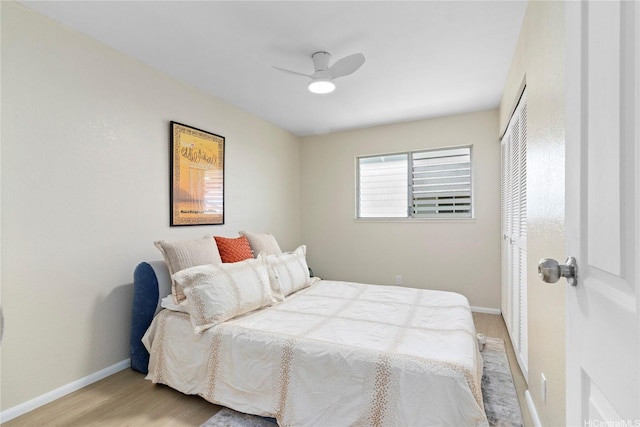 98-467 Hookanike St Unit 758, Pearl City, HI 96782 - bedroom featuring a closet, light wood-type flooring, and a ceiling fan
