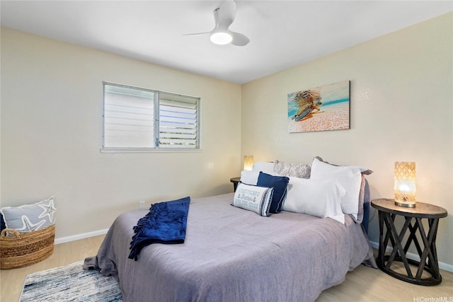 98-467 Hookanike St Unit 758, Pearl City, HI 96782 - bedroom with wood finished floors and ceiling fan