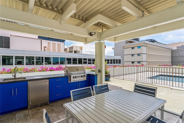 700 Richards St Unit 1709, Honolulu, HI 96813 - view of patio / terrace featuring outdoor dining area, area for grilling, and a pool