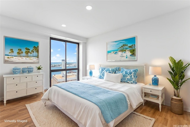 700 Richards St Unit 1709, Honolulu, HI 96813 - bedroom with wood finished floors and recessed lighting