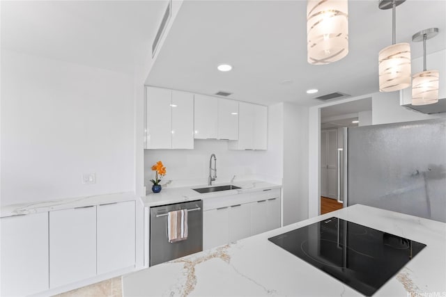 700 Richards St Unit 1709, Honolulu, HI 96813 - kitchen featuring stainless steel appliances, modern cabinets, white cabinetry, light stone countertops, and pendant lighting