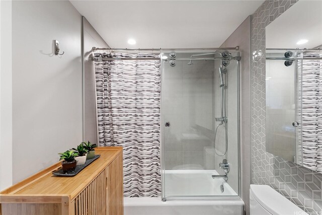 1000 Auahi St Unit 626, Honolulu, HI 96814 - bathroom featuring shower / bathtub combination with curtain and toilet