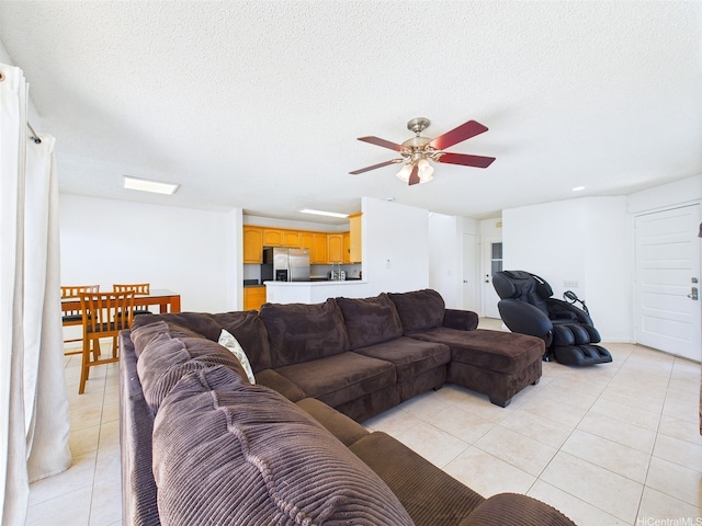 91-2037 Pahuhu Pl, Ewa Beach, HI 96706 - living area with light tile patterned floors, a ceiling fan, and a textured ceiling
