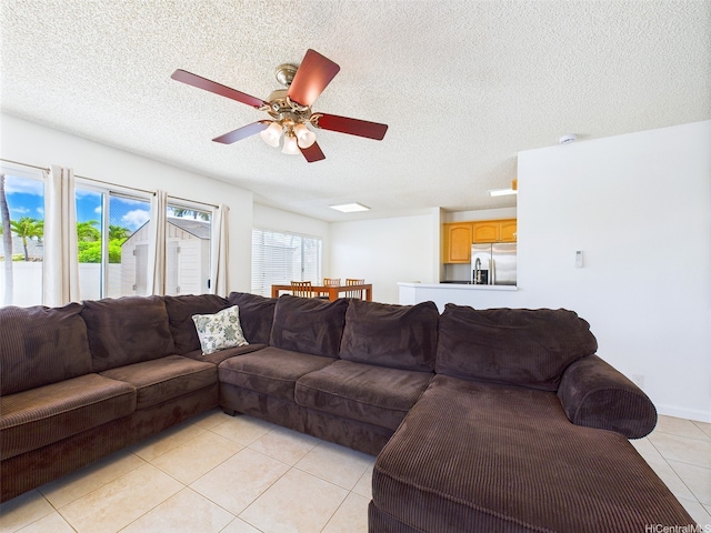 91-2037 Pahuhu Pl, Ewa Beach, HI 96706 - living area featuring light tile patterned floors, a textured ceiling, and ceiling fan