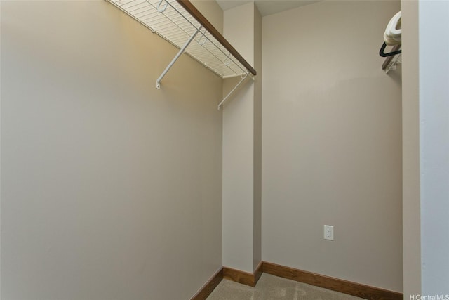 1555 Kapiolani Blvd Unit 1205, Honolulu, HI 96814 - walk in closet with carpet flooring