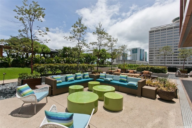 1555 Kapiolani Blvd Unit 1205, Honolulu, HI 96814 - view of patio with an outdoor hangout area and a city view