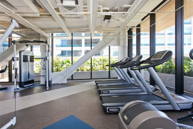 1555 Kapiolani Blvd Unit 1205, Honolulu, HI 96814 - exercise room featuring plenty of natural light and floor to ceiling windows
