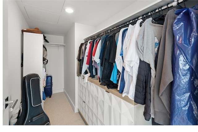 629 Keeaumoku St Unit 2212, Honolulu, HI 96814 - walk in closet featuring attic access and carpet