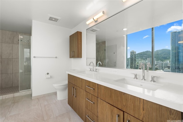 629 Keeaumoku St Unit 2212, Honolulu, HI 96814 - full bathroom featuring double vanity, tiled shower, and a city view