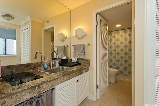 440 Olohana St Unit 1705, Honolulu, HI 96815 - full bathroom featuring a closet, double vanity, ornamental molding, and tile patterned flooring