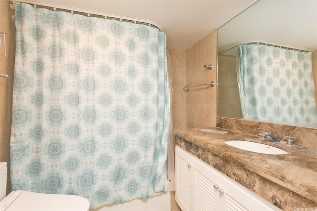 440 Olohana St Unit 1705, Honolulu, HI 96815 - bathroom featuring vanity and shower / tub combo