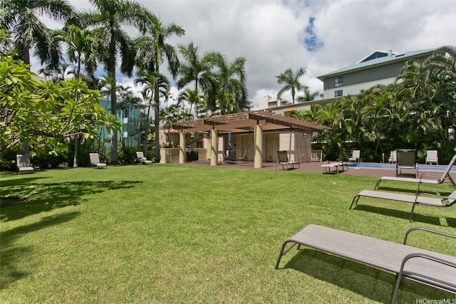 440 Olohana St Unit 1705, Honolulu, HI 96815 - view of green lawn with a pergola, an outdoor pool, and a patio
