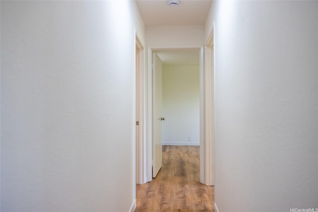255 Mananai Pl Unit 52T, Honolulu, HI 96818 - hall with light wood-type flooring
