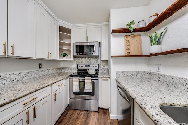 585 Mananai Pl Unit 26U, Honolulu, HI 96818 - kitchen with open shelves, stainless steel appliances, dark wood finished floors, and white cabinets