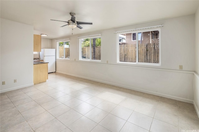 4134 Likini St, Honolulu, HI 96818 - unfurnished living room with a ceiling fan and light tile patterned flooring