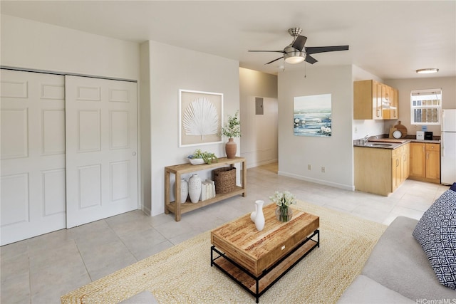 4134 Likini St, Honolulu, HI 96818 - living room with light tile patterned floors and a ceiling fan