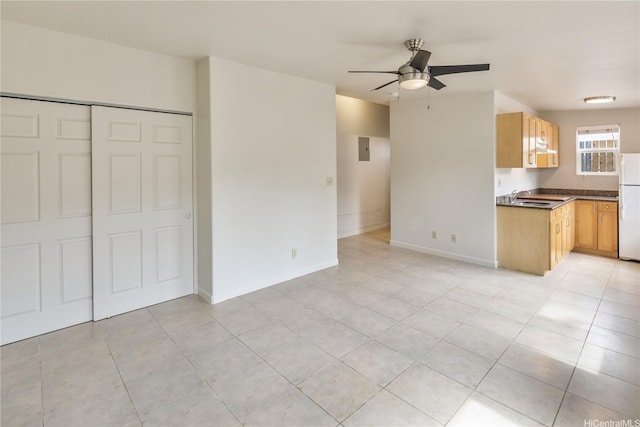 4134 Likini St, Honolulu, HI 96818 - kitchen featuring freestanding refrigerator, a ceiling fan, dark countertops, open floor plan, and light tile patterned flooring