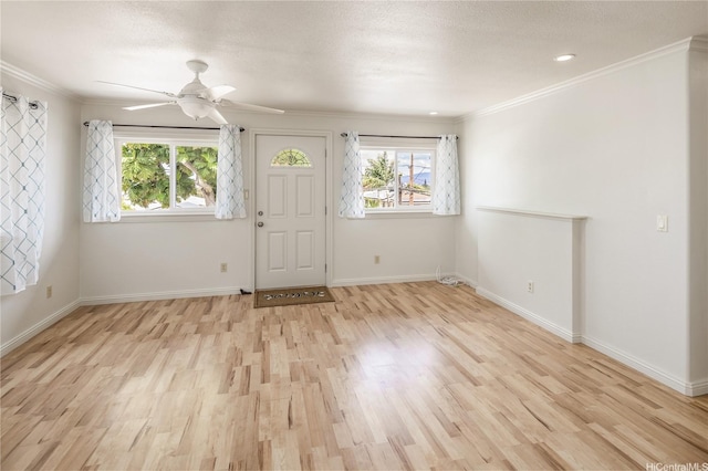 4134 Likini St, Honolulu, HI 96818 - entryway featuring healthy amount of natural light, light wood-style floors, ceiling fan, and ornamental molding