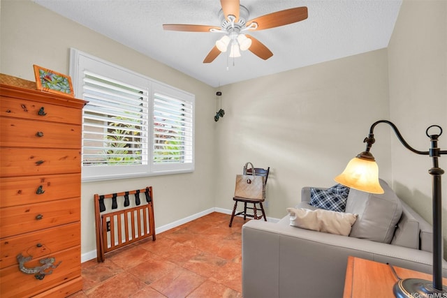 94-517 Poloahilani St, Mililani, HI 96789 - living area featuring ceiling fan and a textured ceiling