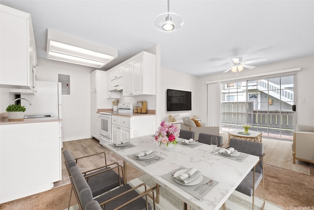 94-1369 Kulewa Loop Unit 14B, Waipahu, HI 96797 - dining room featuring ceiling fan and electric panel