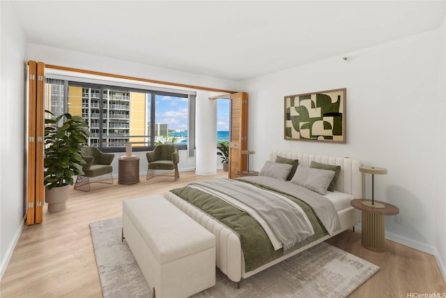 1330 Ala Moana Blvd Unit 1907, Honolulu, HI 96814 - bedroom featuring wood finished floors and baseboards