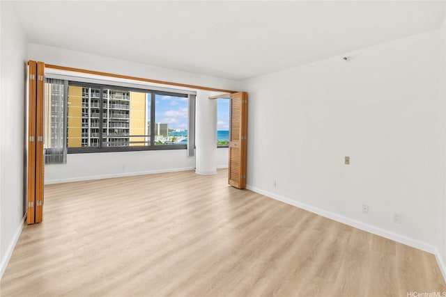 1330 Ala Moana Blvd Unit 1907, Honolulu, HI 96814 - unfurnished room featuring wood finished floors