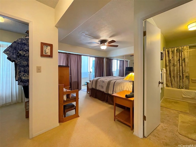 320 Ainakea Way Unit 812, Honolulu, HI 96815 - bedroom with carpet, a textured ceiling, and a ceiling fan