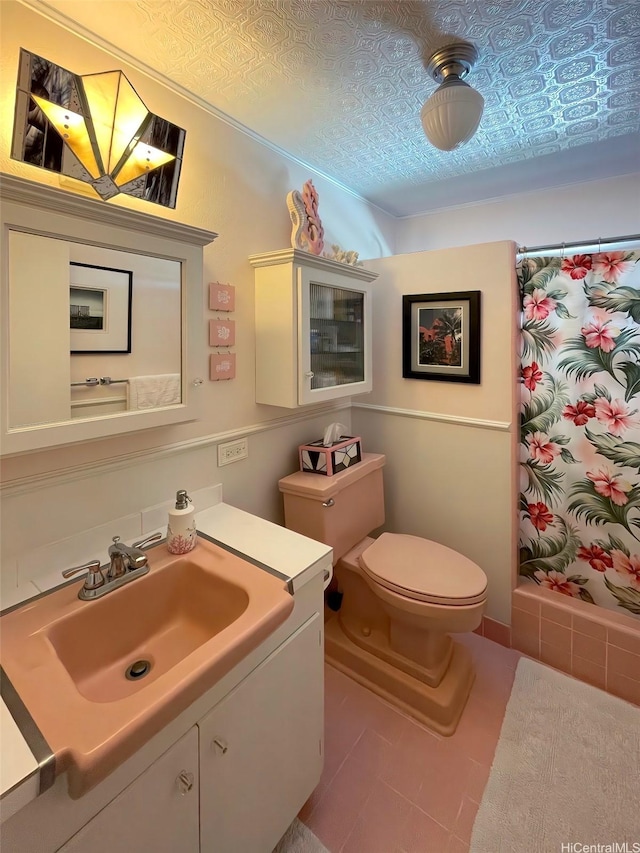 320 Ainakea Way Unit 812, Honolulu, HI 96815 - bathroom featuring vanity, a shower with shower curtain, tile patterned flooring, and an ornate ceiling
